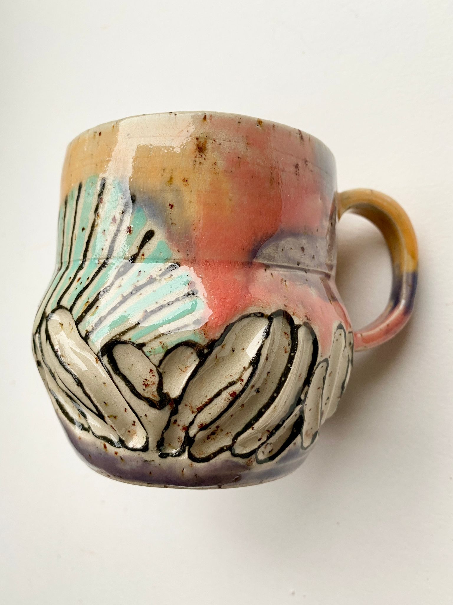 Tasse gelb / lachs / türkis / lila