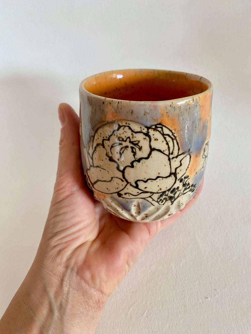 Tasse Blüten orange / lila