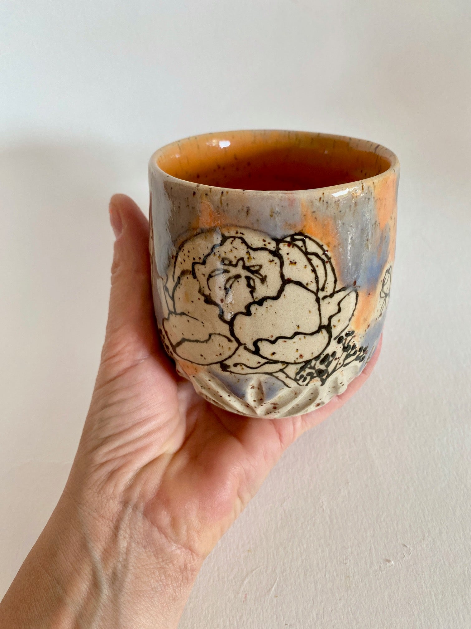 Tasse Blüten orange / lila