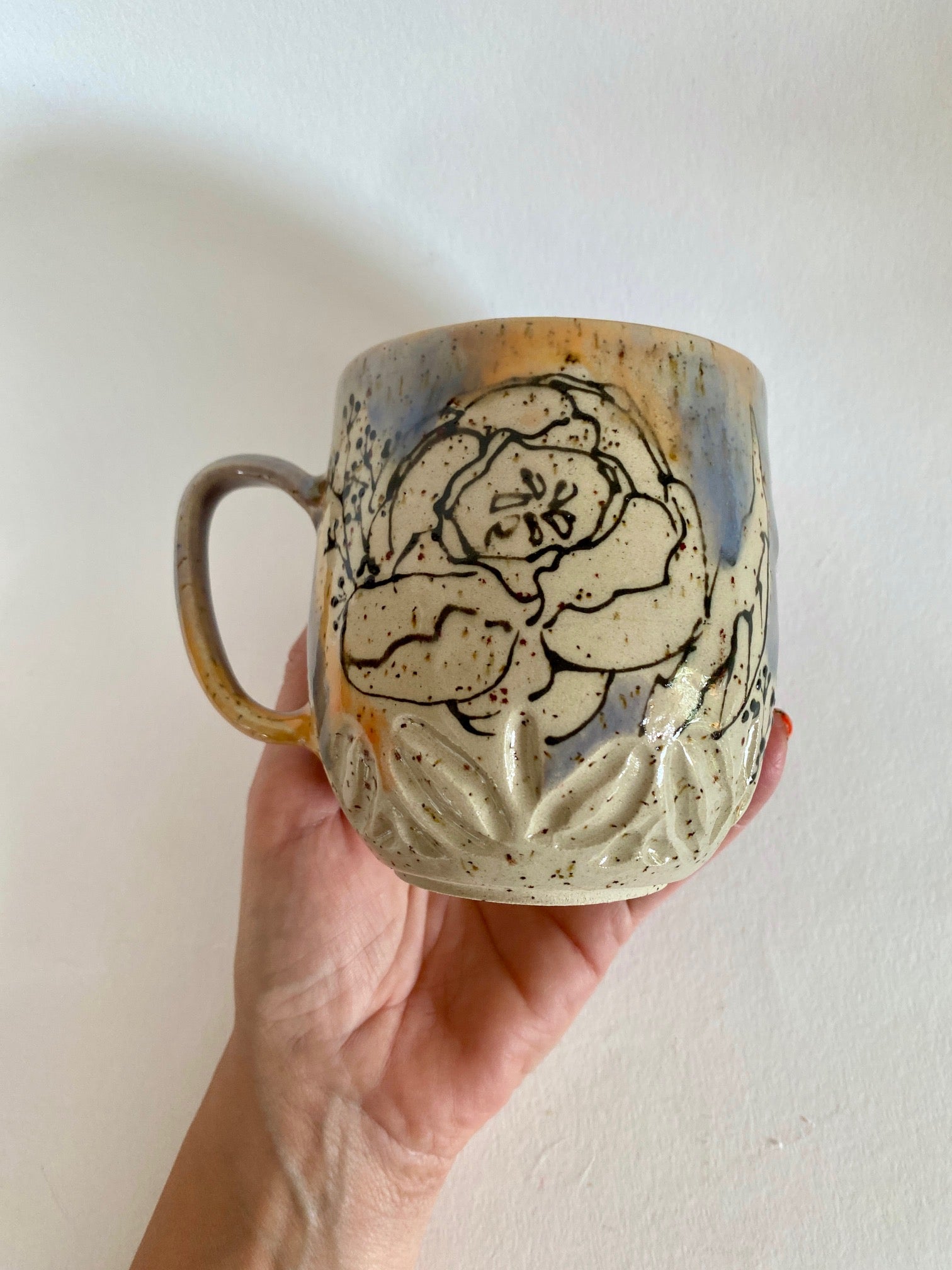 Tasse Blüten orange / lila