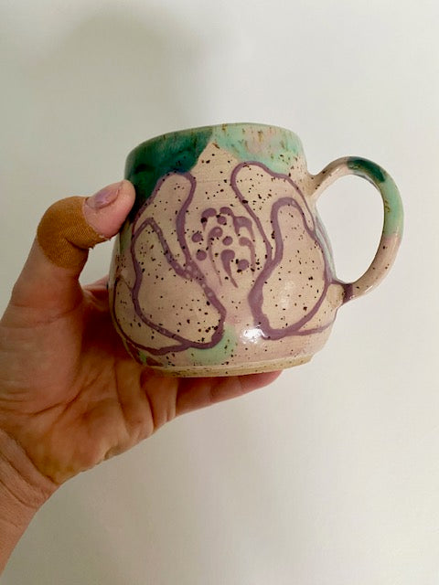 Große Tasse türkis / violett / gestreift