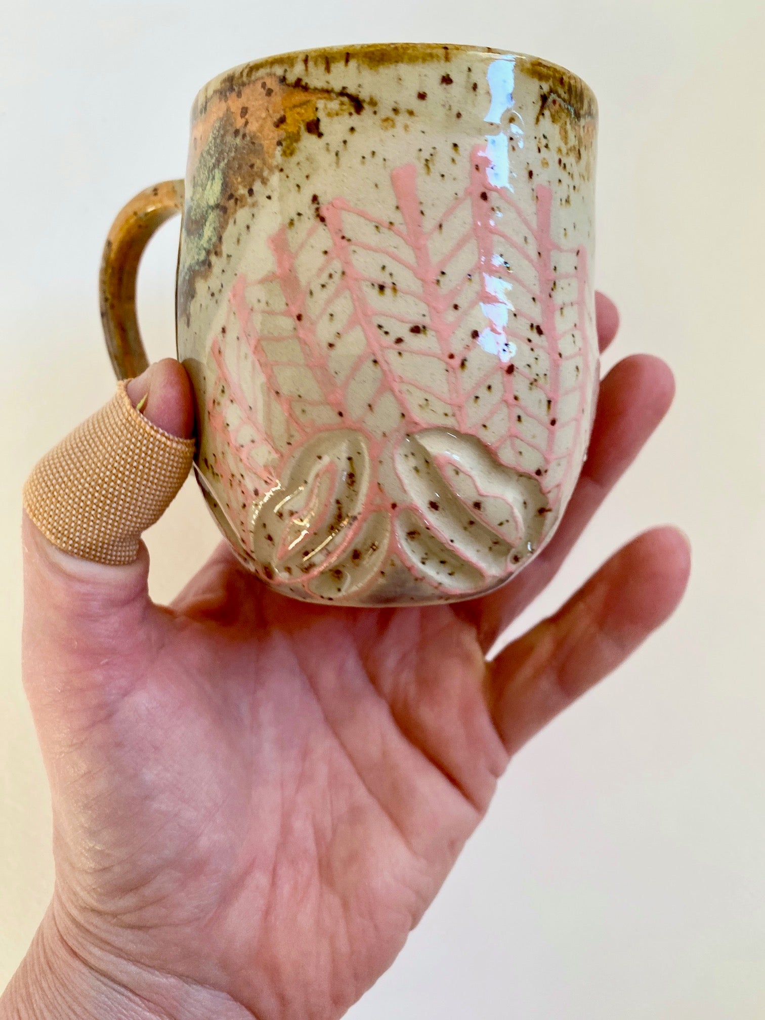 Tasse Fischgrätenmuster  orange / mint / bronze / rosa / lila