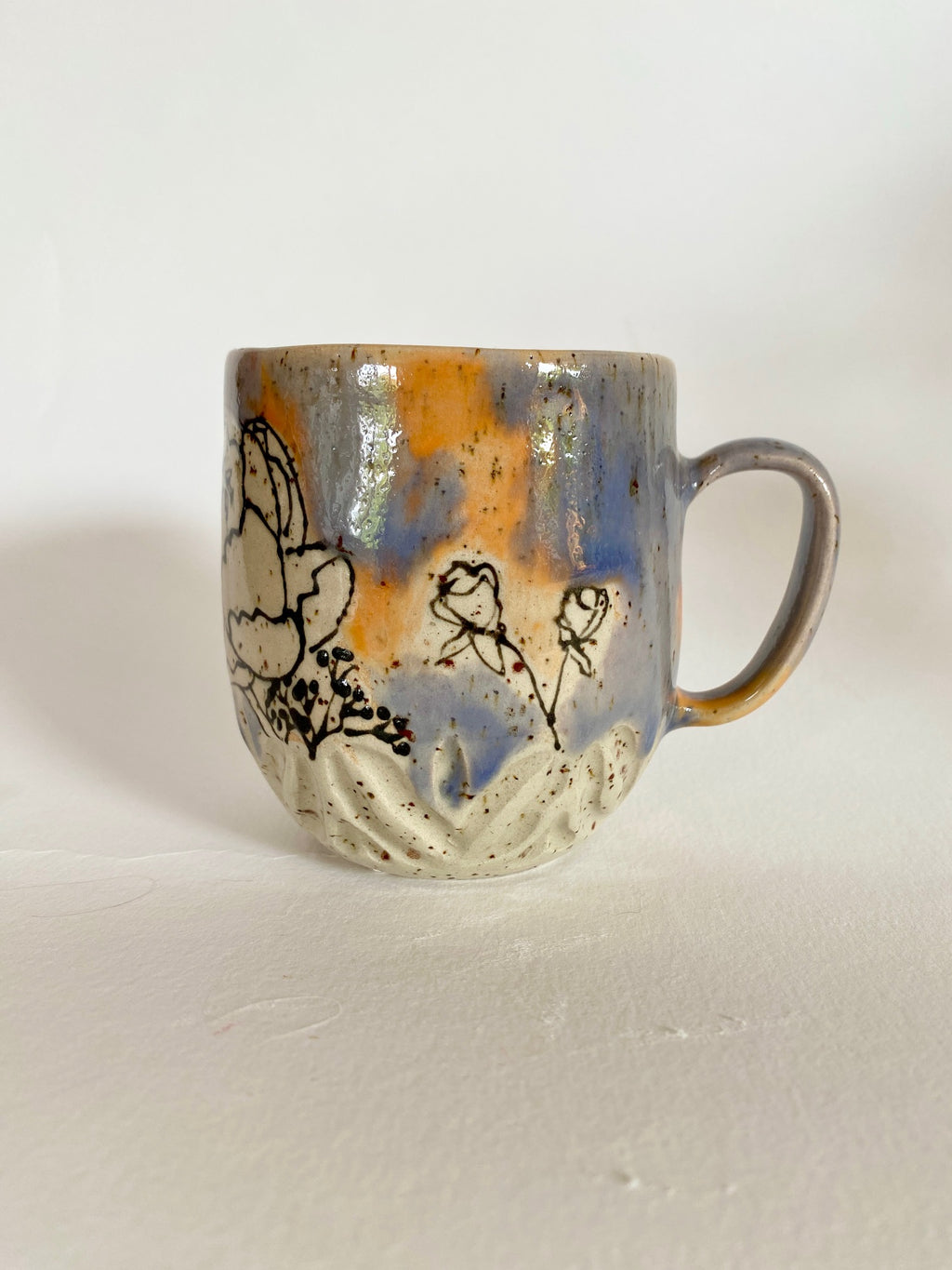 Tasse Blüten orange / lila