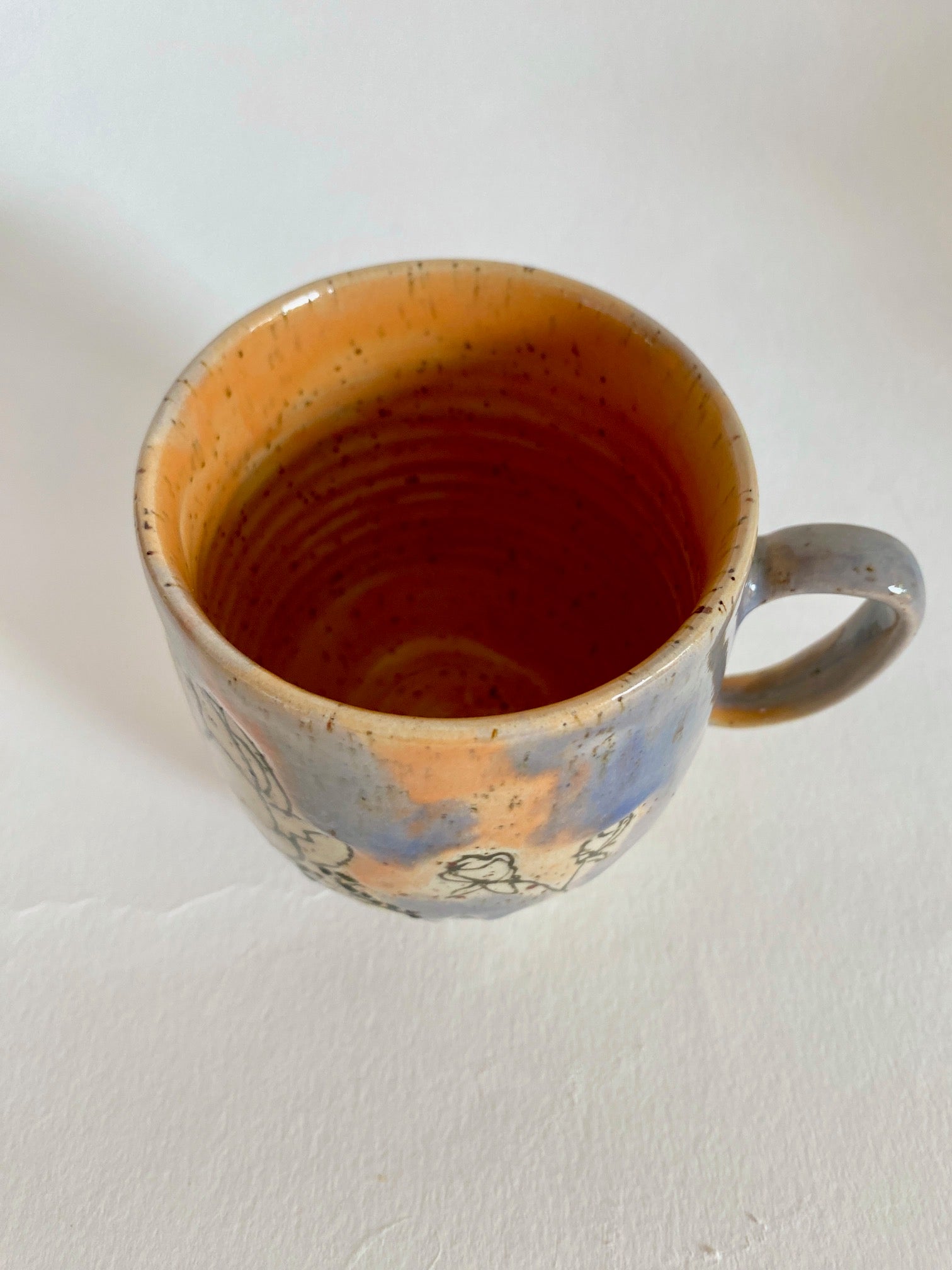 Tasse Blüten orange / lila